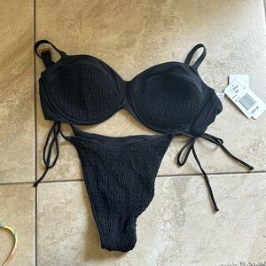 Lspace bikini. DD top NWT. Bottoms worn size S.